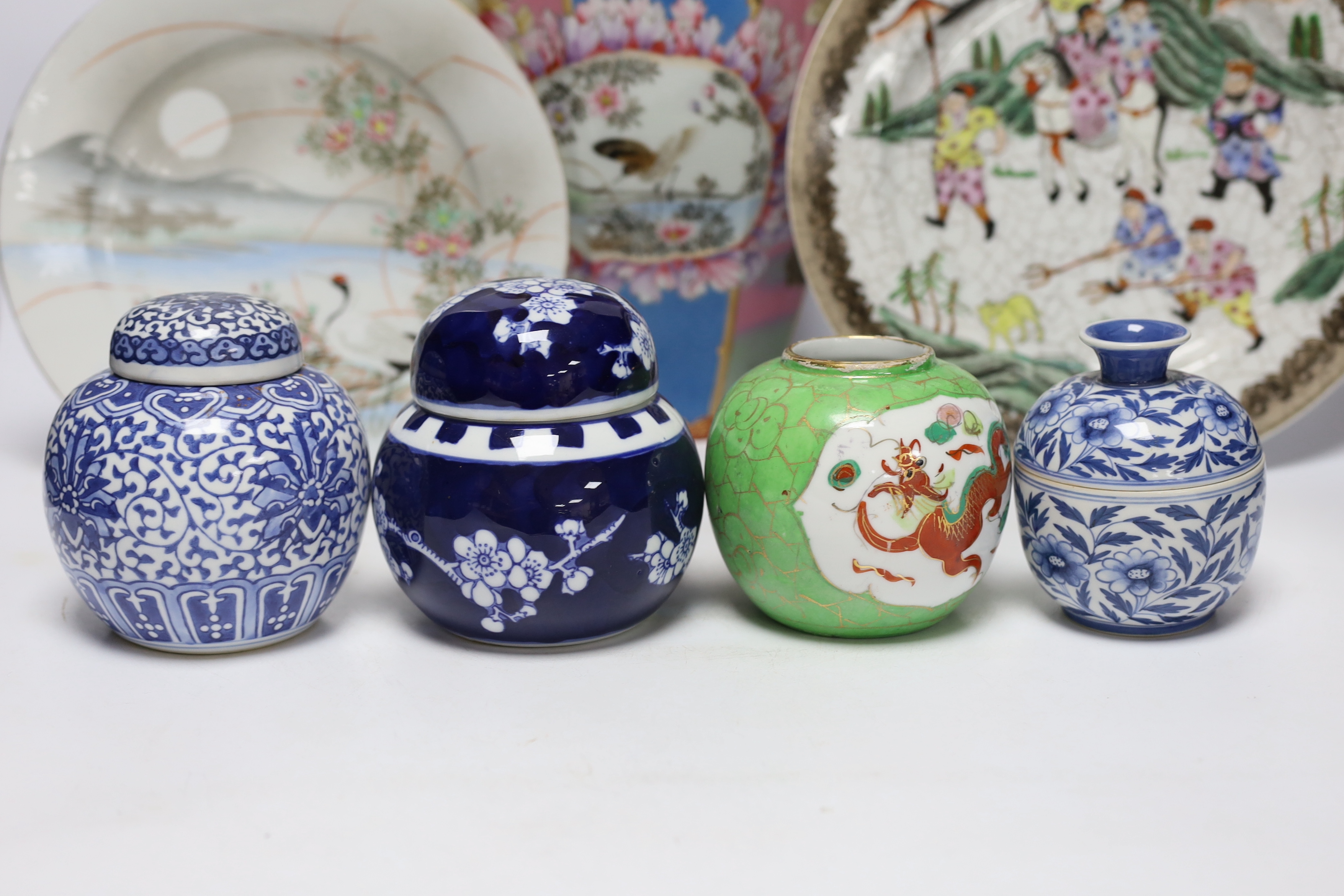A group of Japanese and Chinese porcelain including an 18th century Chinese export dish, tallest 36cm